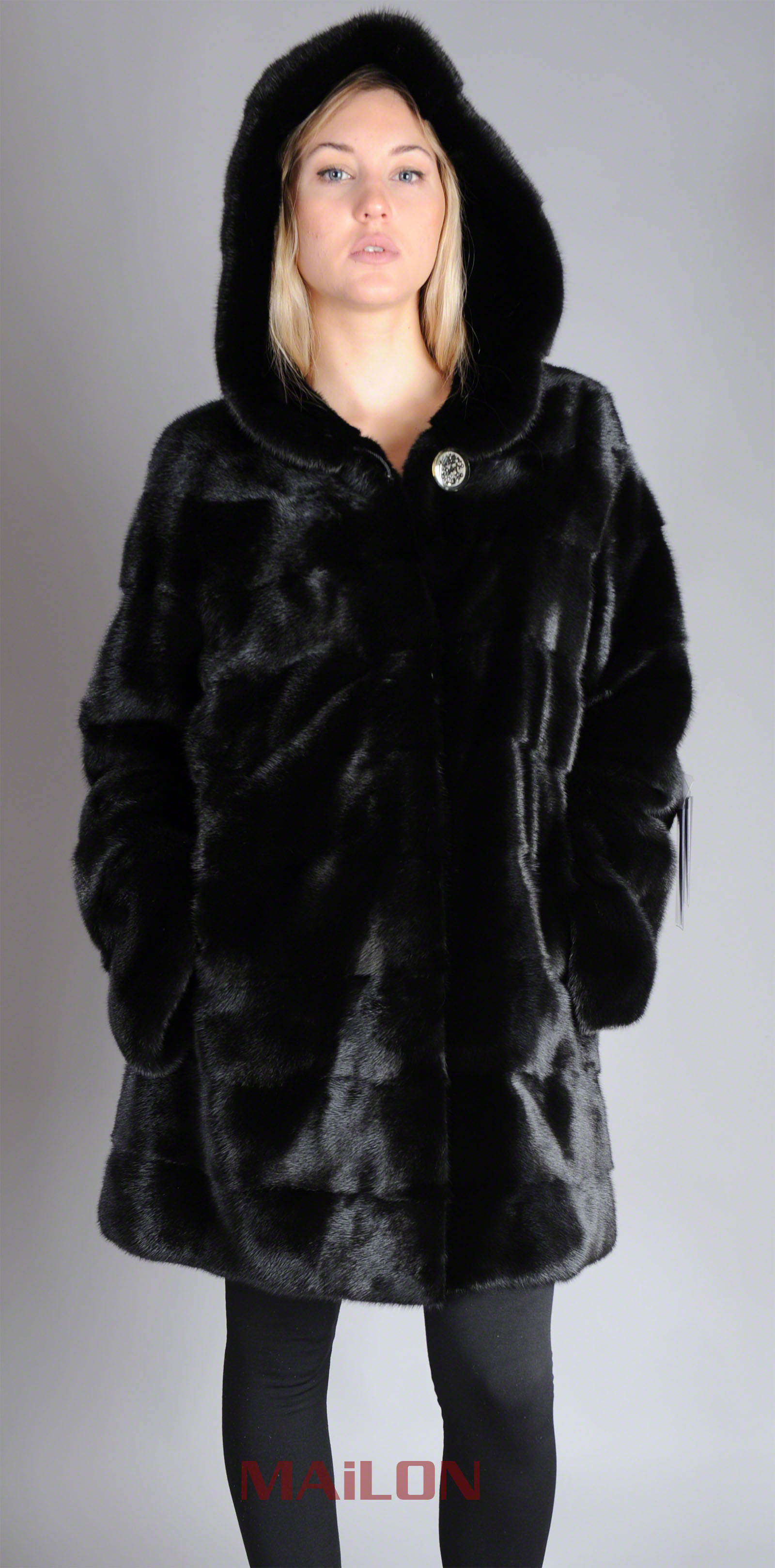 Hooded Black Mink coat with pelts across