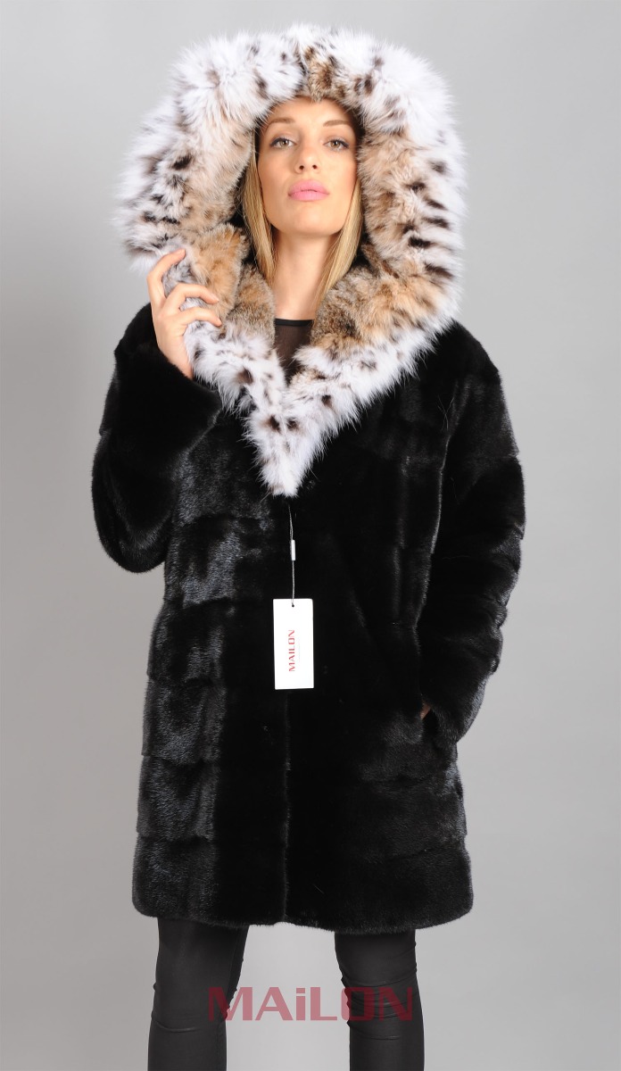 Black Mink parka with Lynx hood and pelts across